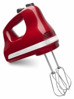 Red hand mixer with beaters attached