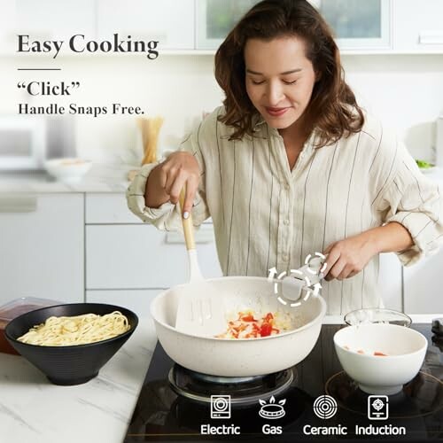 Woman cooking with induction cooktop in kitchen